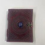 Libro De Piel Color marron con relieve simétrico y gema en azul